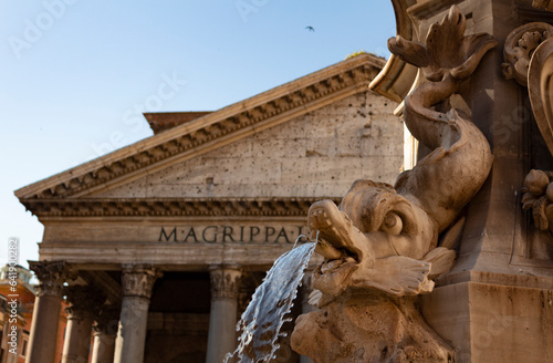 Sculpted Fountain in front of roman building