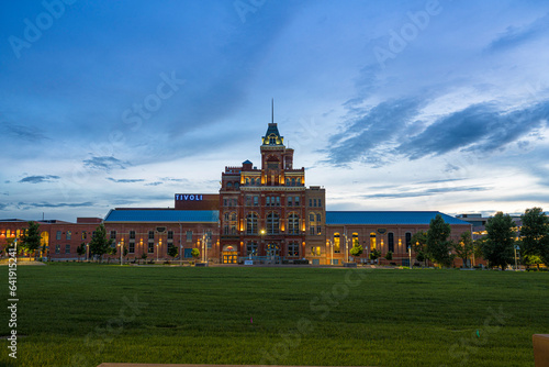 Obraz na plátně Tivoli Building at Auraria Campus glowing under a twilight sky in Denver