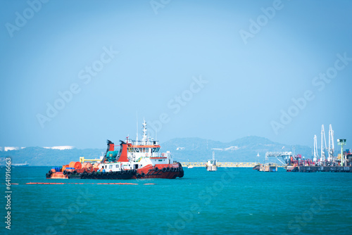 large tugboat waiting to work at sea
