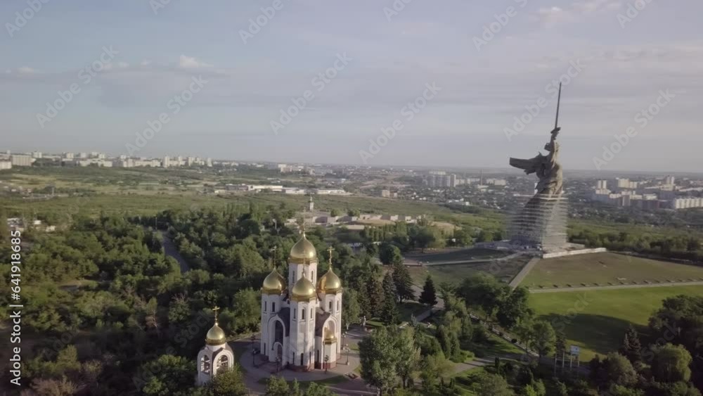 Circling from the air over Mamayev Kurgan and Hall of Military Glory to reveal The Motherland Calls monument in Volgograd, Russia. Circling from the air over Mamayev Kurgan and Hall of Military Glory to reveal The Motherland Calls monument in Volgograd, Russia.