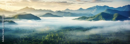 Generative AI   Foggy landscape in the jungle at sunrise. Fog and cloud mountain tropic valley landscape