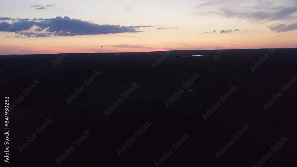 Drone shot tracking a sky lantern over moorland on the Isle of Lewis. Drone shot tracking a sky lantern over moorland on the Isle of Lewis.