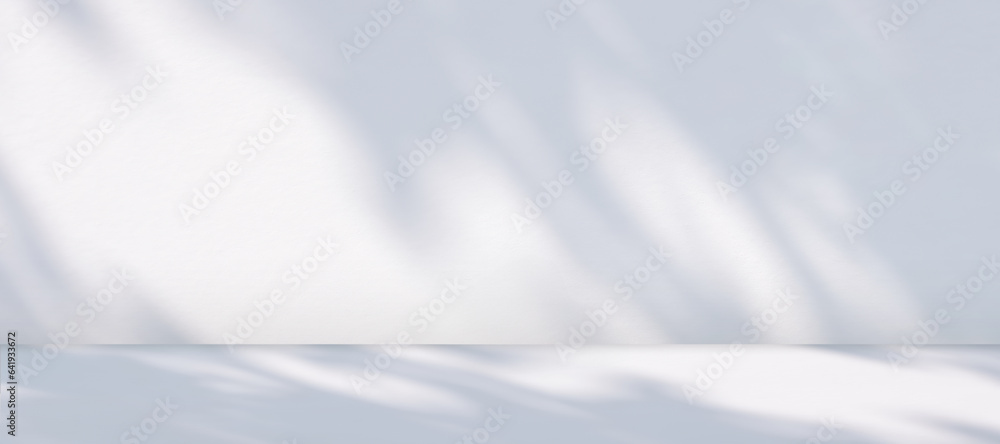 Fototapeta premium Panoramic view of empty table counter with sunlight and branch shadow on white cement wall room background, suitable for product mockup Display Presentation