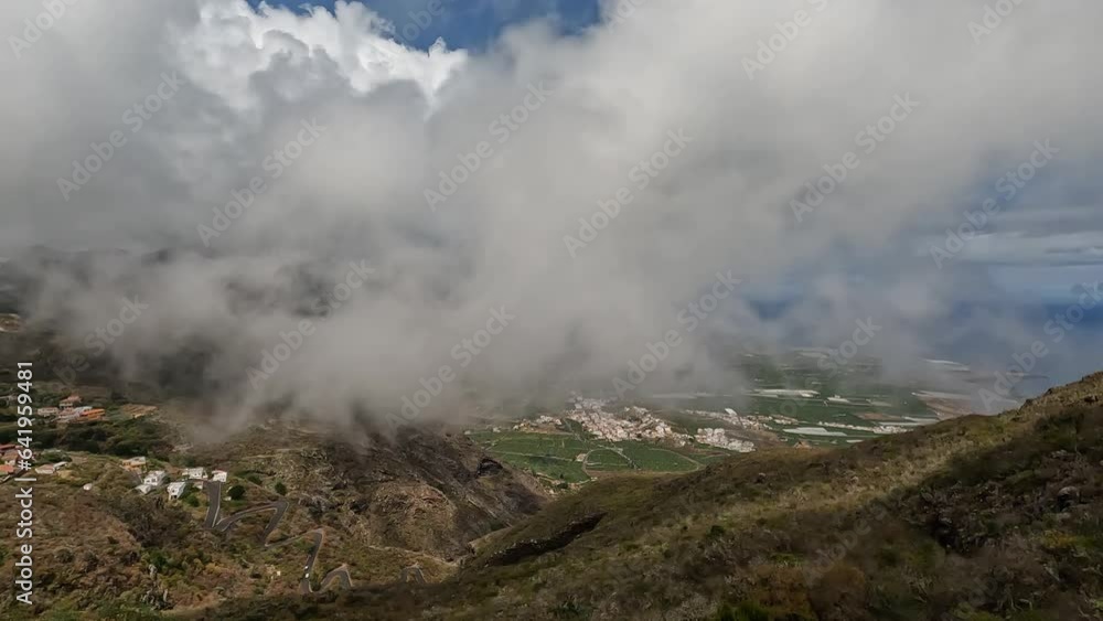 Static shot of fast rolling clouds on the north coast of Tenerife, Canary Islands