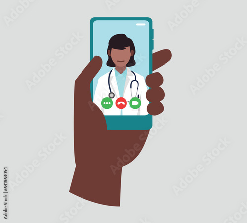 A doctor looks at us directly, she wears a stethoscope around her neck on a smartphone screen