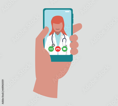 A doctor looks at us directly, she wears a stethoscope around her neck on a smartphone screen