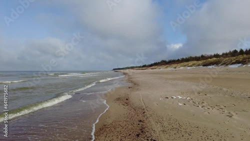 Beach and sea on cold dar day