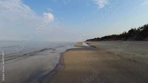 Beach and sea on cold dar day