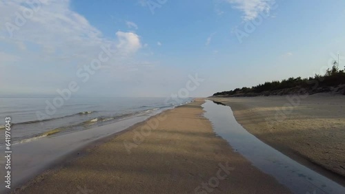Beach and sea on cold dar day