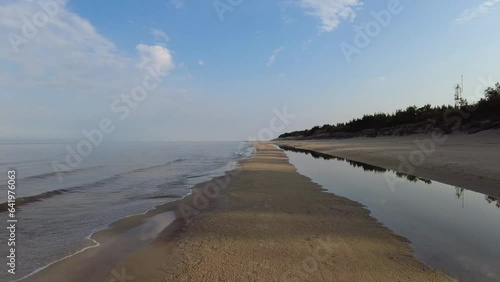 Beach and sea on cold dar day