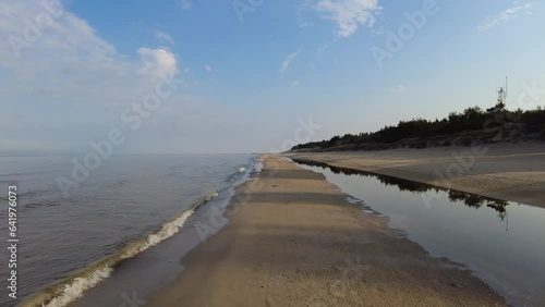 Beach and sea on cold dar day