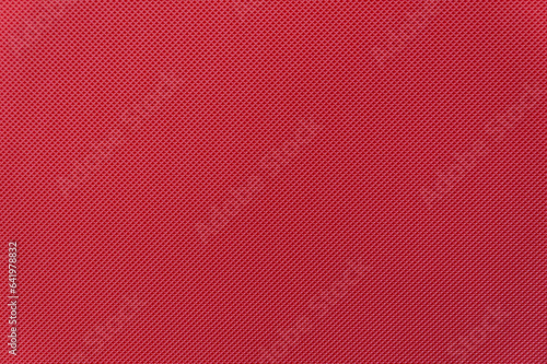 Red touristic rug as a pattern, texture, background