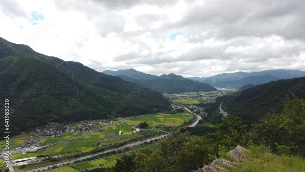 Panoramic Landscape of Asago City Between Green Agricultural Valleys Japan Town Outdoors view from Takeda Castle Ruins, Japanese Travel and Tourism Destination Panoramic Landscape of Asago City Between Green Agricultural Valleys Japan Town Outdoors view from Takeda Castle Ruins, Japanese Travel and Tourism Destination