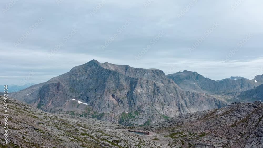 Lille Salberget Mountain Peaks Near Flakstad In Senja, Troms og Finnmark County, Norway. Lille Salberget Mountain Peaks Near Flakstad In Senja, Troms og Finnmark County, Norway.