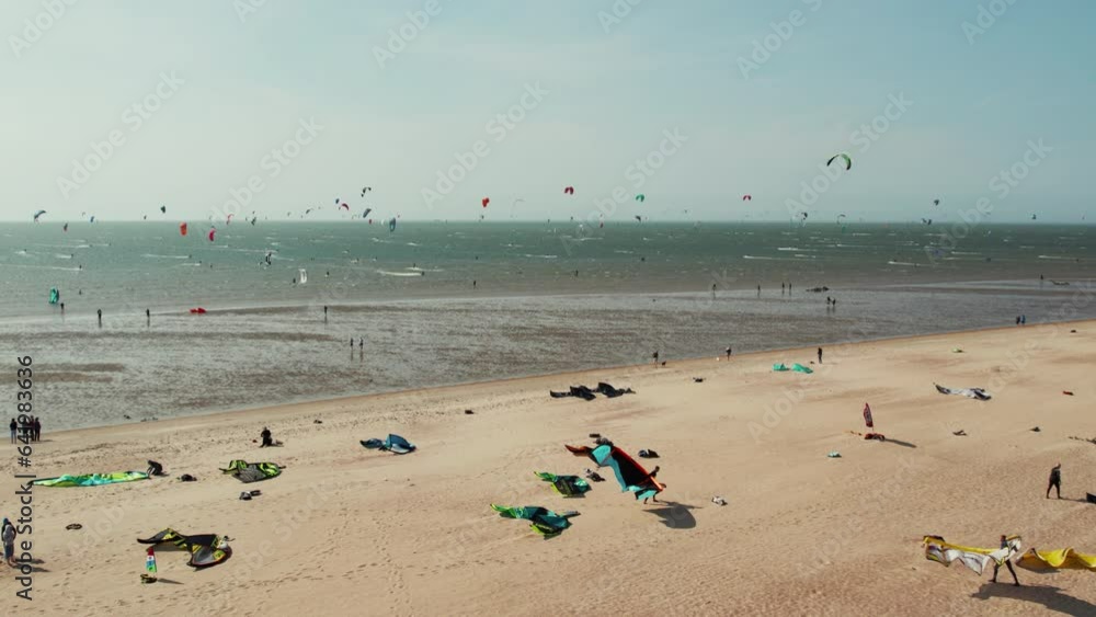 Famous Spot For Kitesurfing Sports At The North Sea Beach In Brouwersdam, Zeeland, The Netherlands. Aerial, Slow-mo
