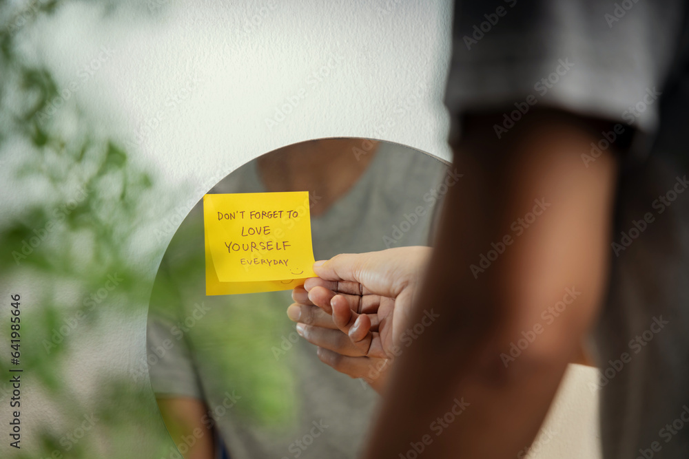 Self Love Concept. Person Reading Note on the Mirror. Mental Health Remind and Practice to Start the Day with a Optimistic Mind Self Love Concept. Person Reading Note on the Mirror. Mental Health Remind and Practice to Start the Day with a Optimistic Mind