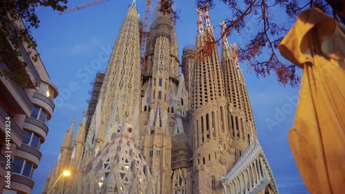 view of the sagrada familia from one of the side streets, barcelona, ​​spain