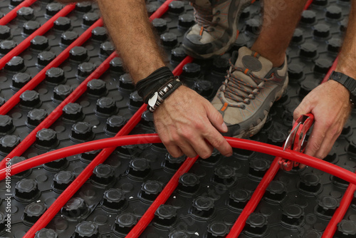 Cuadro en lienzo Water underfloor heating systems installation, work in progress on construction
