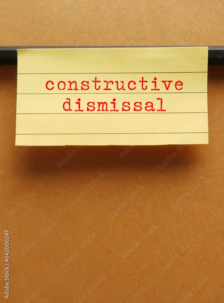 Obraz premium Office envelope with text written Constructive Dismissal (Constructive Discharge), where employee is forced to leave or quit job by employer conduct hostile workplace or intolerable situation