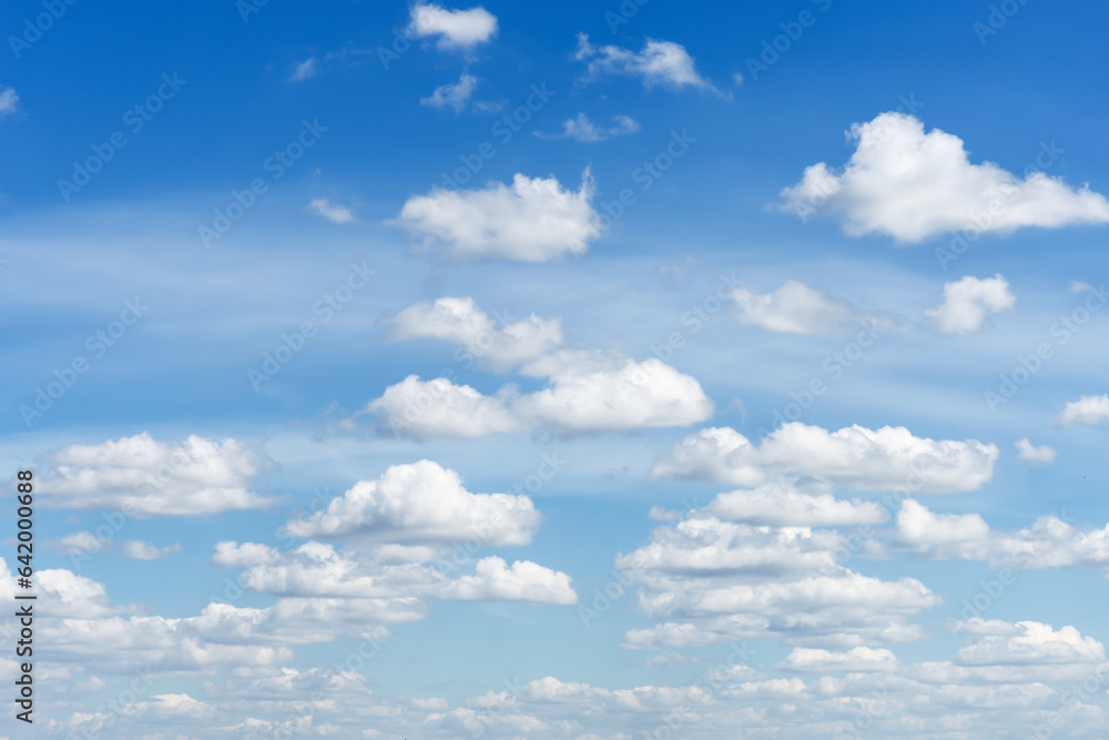 Cumulus clouds in blue sky, white fluffy clouds floating in blue sky, blue sky background with clouds Cumulus clouds in blue sky, white fluffy clouds floating in blue sky, blue sky background with clouds