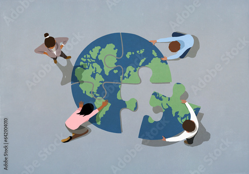 Global business people connecting earth jigsaw puzzle
 photo