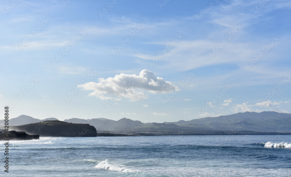 Lovely Seascape with Hills, Oceans and Clouds Lovely Seascape with Hills, Oceans and Clouds