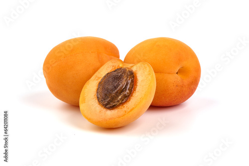 Sweet juicy yellow apricots, ripe nectarines, isolated on white background.