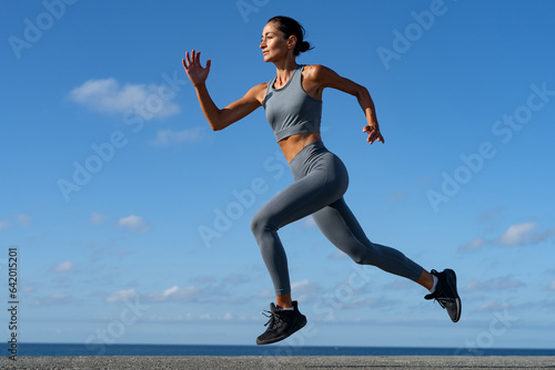 athletic brunette girl doing fitness doing exercises leading a healthy lifestyle