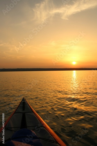 kayaking on a lake in Bavaria at sunset © johannes81