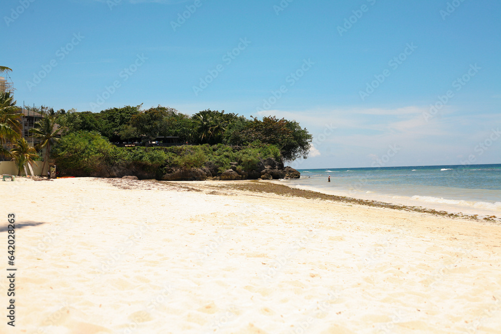 Beautiful beach with blue waters, white sand and clear sky at Alona Beach, Bohol, Philippines. Beautiful beach with blue waters, white sand and clear sky at Alona Beach, Bohol, Philippines.