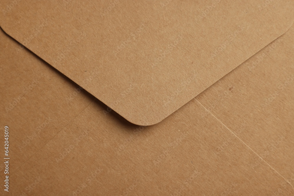 Envelope made of parchment paper as background, top view Envelope made of parchment paper as background, top view