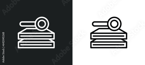 stack of books and magnifier icon isolated in white and black colors. stack of books and magnifier outline vector icon from education collection for web, mobile apps ui.