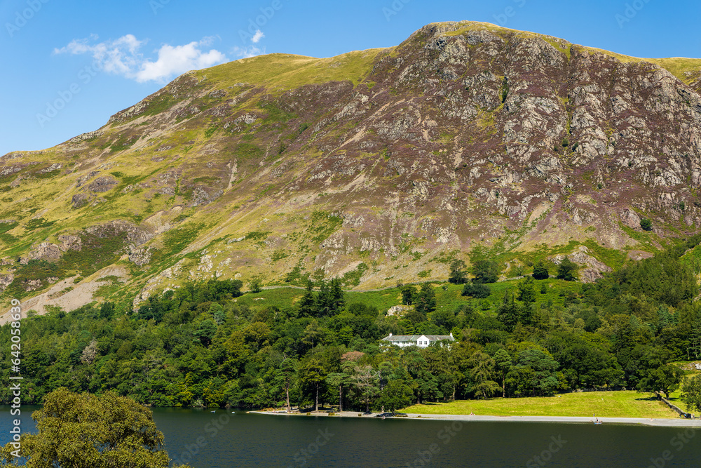 A beautiful, calm lake surrounded by high mountains in summer (Buttermere, Lake District)