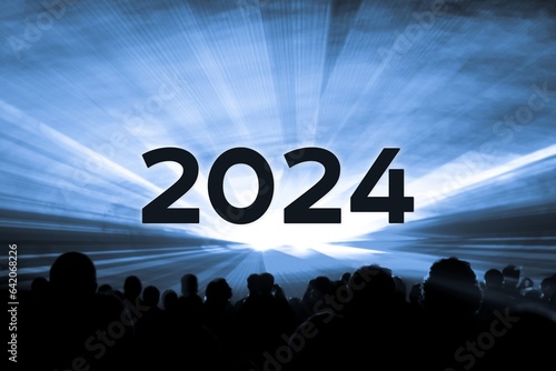 Happy new year 2024 blue laser show party people crowd. Luxury entertainment with audience silhouettes turn of the year celebration. Premium nightlife event at holidays season party time