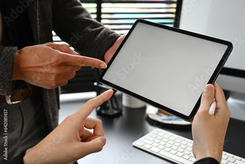Close-up image of a business meeting, creative designer or graphic designer, Empty screen of tablet