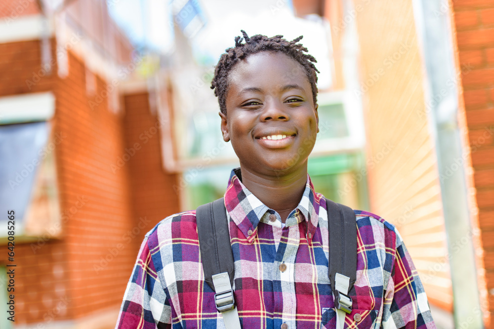 Portrait Of Male Teenage Student Outside Buildings Portrait Of Male Teenage Student Outside Buildings