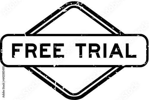 Grunge black free trial word rubber seal stamp on white background