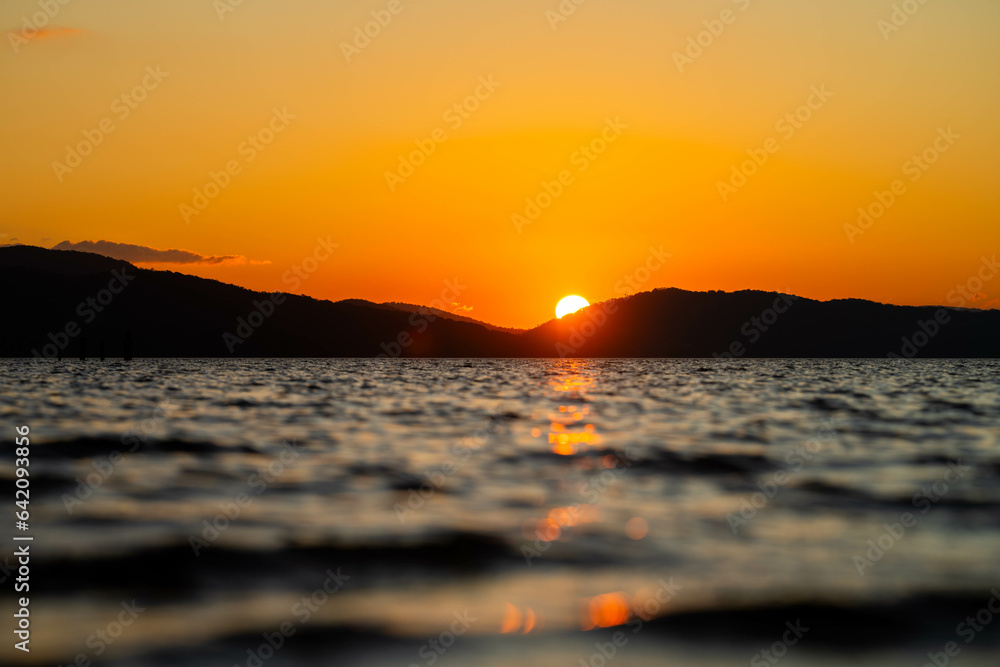 red sunset over mountains and a lake in australia red sunset over mountains and a lake in australia