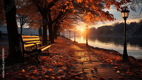 Picturesque natural autumn landscape with the sun in the forest and a mountain of orange leaves.