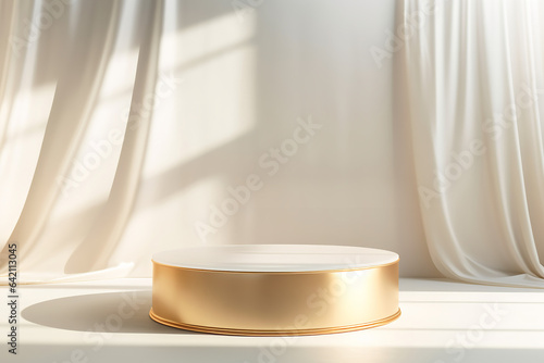 Modern and luxury gold colored round shiny pedestal podium steel in dappled sunlight from window with blowing white sheer curtain in white cream wall background for product display