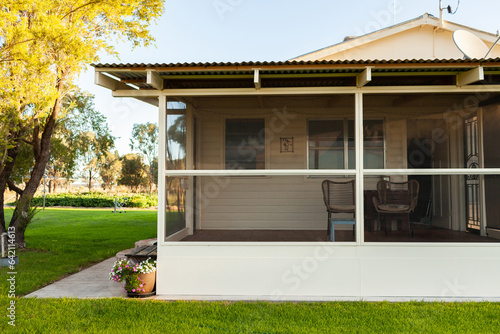 Farmhouse with fly screen veranda enclosed deck