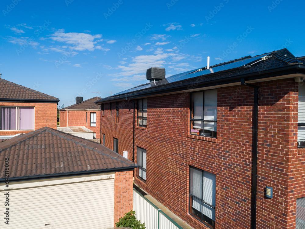 Close packed brick buildings in city suburb Close packed brick buildings in city suburb