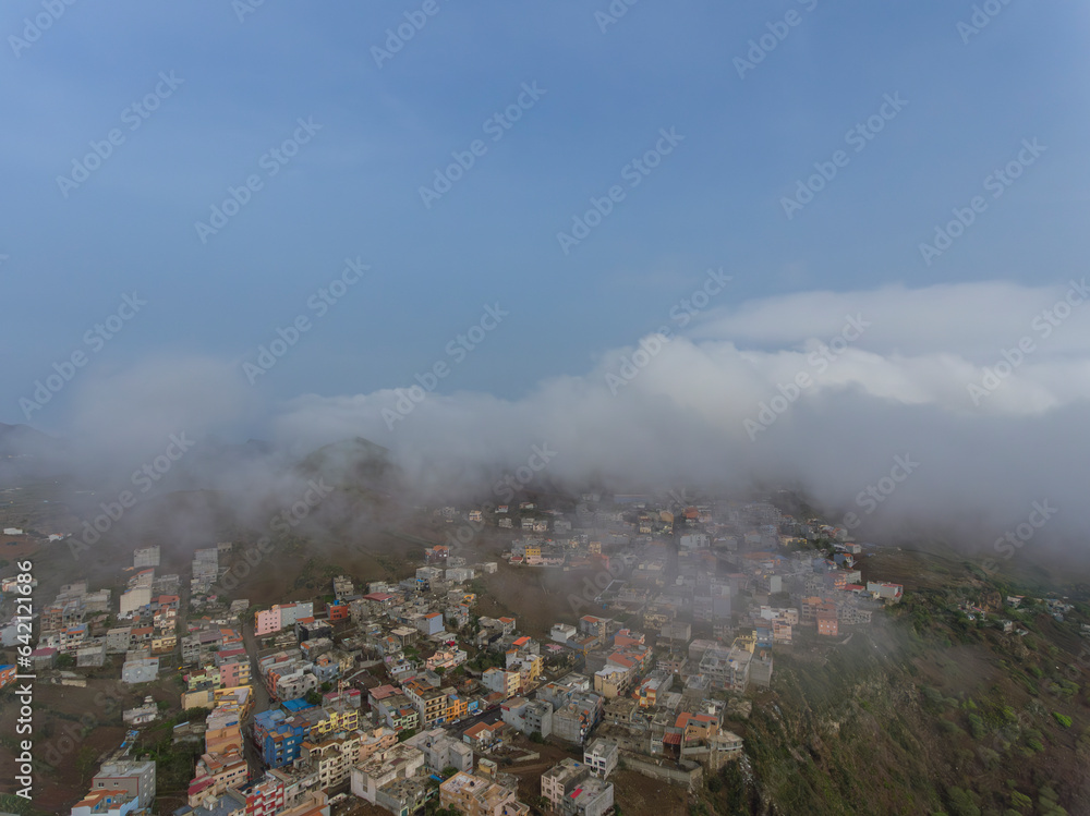 Aerial photos of Assomada in Santiago Island, Cabo Verde, reveal the vibrant culture, colorful markets, and stunning mountain landscapes of this historic town. The bird's-eye view captures the essence Aerial photos of Assomada in Santiago Island, Cabo Verde, reveal the vibrant culture, colorful markets, and stunning mountain landscapes of this historic town. The bird's-eye view captures the essence
