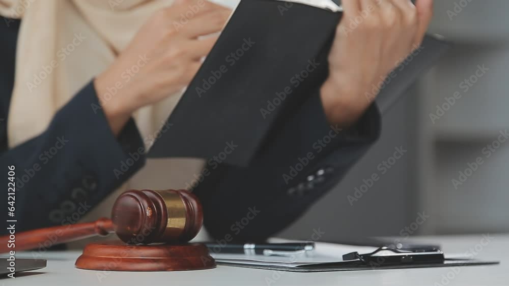 Business and lawyers discussing contract papers with brass scale on desk in office. Law, legal services, advice, justice and law concept picture with film grain effect Business and lawyers discussing contract papers with brass scale on desk in office. Law, legal services, advice, justice and law concept picture with film grain effect
