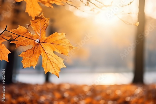 orange leaves in autumn with blurry background of trees and lake  ai generated