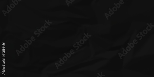 	
Dark crumple black paper wrinkled poster template ,blank glued creased paper texture background. black paper crumled backdrop background. used for cardboard and clarkboard.