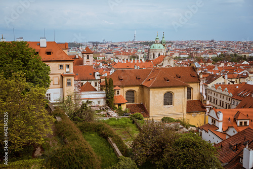 Top view to red roofs skyline of Prague city, Czech Republic. Aerial view of Prague city with terracotta roof tiles, Prague, Czechia. Old Town architecture with terracotta roofs in Prague