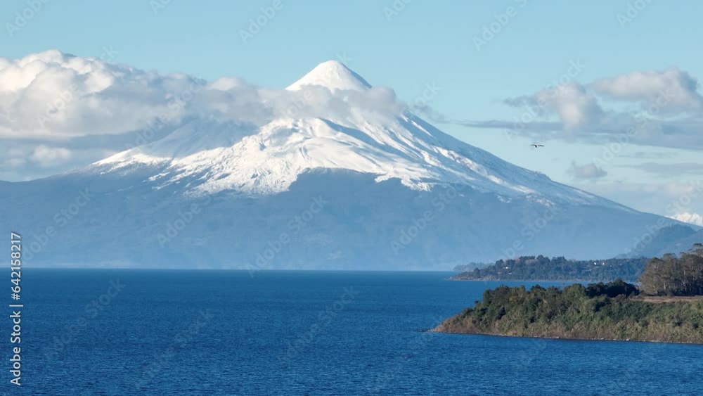 Osorno Volcano At Llanquihue Lake In Los Lagos Chile. Volcano Landscape. Bay Water Background. Los Lagos Chile. Snowcapped Mountain. Osorno Volcano At Llanquihue Lake In Los Lagos Chile. Osorno Volcano At Llanquihue Lake In Los Lagos Chile. Volcano Landscape. Bay Water Background. Los Lagos Chile. Snowcapped Mountain. Osorno Volcano At Llanquihue Lake In Los Lagos Chile.