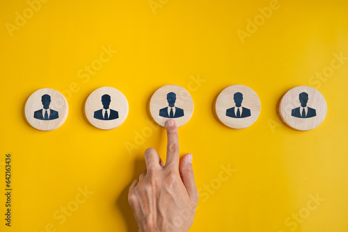 search, seek, hr, find, background, talent, management, resource, choose, executive. background image is wooden five pieces sort it then use finger select that. then color background is orange pastel