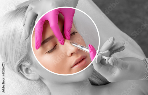 The doctor does injections to correct the hump on the nose with the beauty of the blonde. The beautician doees injections against wrinkles on the face. Women's cosmetology in a beauty salon. photo